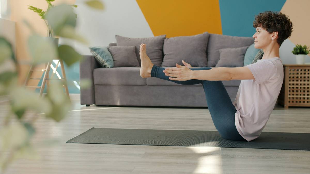 man doing 5-minute post-meal walk indoors as weight loss tips at home exercise strategy